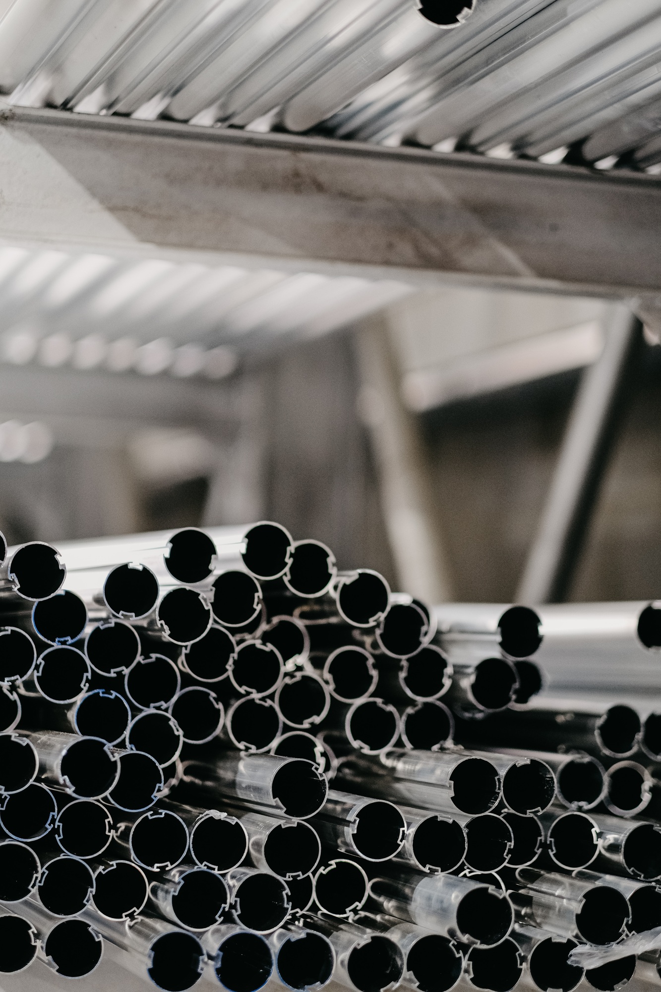 Metal rods in roller blind factory